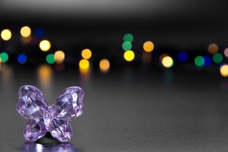 glass butterfly on a colorful background bokehの写真素材
