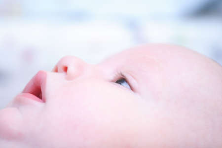 Baby's face in profile close-upの写真素材
