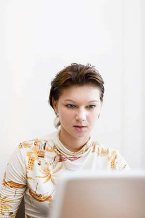 Girl working on laptopの写真素材