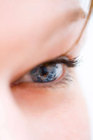 Office interior reflections in eyeの写真素材