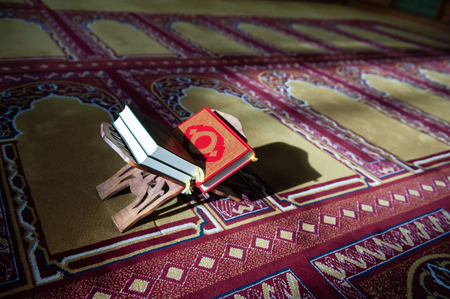 Koran book red and green