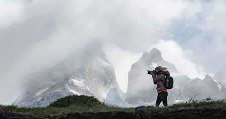 Woman with dslr camera