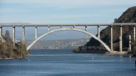 Bridge type open spandrel deck arch