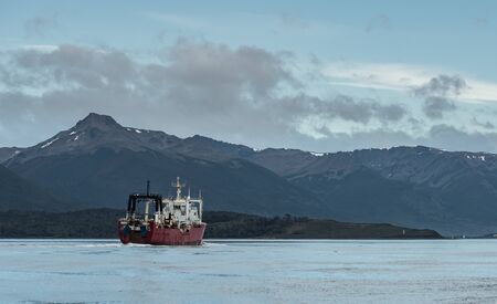 Ushuaia, Argentina - March 27 2019:  Fishing boat sailing on the Beagle channel between Argentina and Chileのeditorial素材
