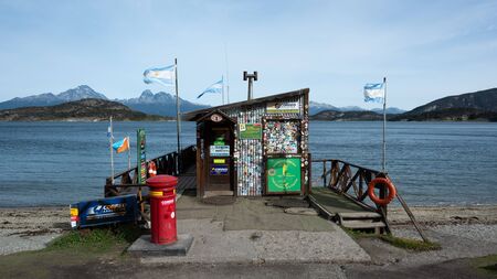 Ushuaia, Argentina - March 28 2019:  It is the facade of the southernmost post office in the world on a windy day. Located in the national park of Tierra del Fuego.のeditorial素材