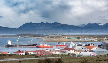 Ushuaia, Argentina - April 2 2012: Streets, architecture, the bay, airport and harbor.のeditorial素材