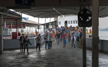 Rio de Janeiro, Brazil - August 17 2013: PraÃ§a XV ferry terminal station. People descending the ferry to the stationのeditorial素材