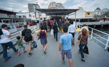 Rio de Janeiro, Brazil - August 17 2013: PraÃ§a XV ferry terminal station. People descending the ferry to the stationのeditorial素材