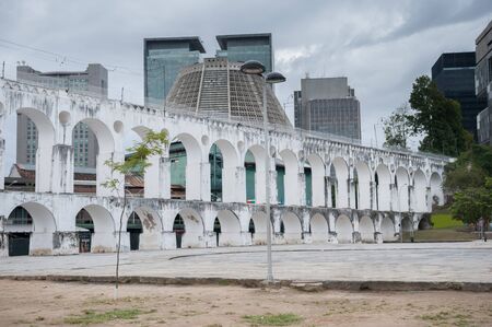 Rio de Janeiro, Brazil - August 18 2013: Arches of Lapa and city in downtown.のeditorial素材