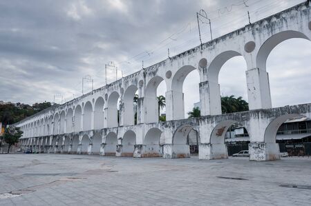 Rio de Janeiro, Brazil - August 18 2013: Arches of Lapa and city in downtown.のeditorial素材