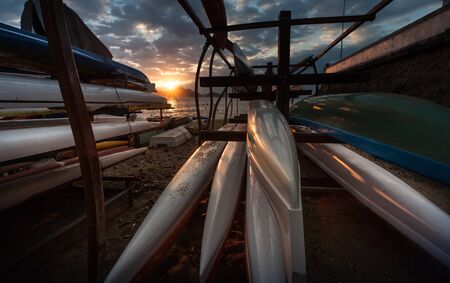 Rio de Janeiro, Brazil - August 17 2013: Group of outrigger canoes parked on the beach. Photo taken in Red beach, next to the sugarloaf mountain.のeditorial素材