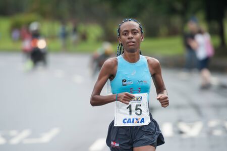 Rio de Janeiro, Brazil - August 18 2013: Athetes of the International half marathon of Rio de...