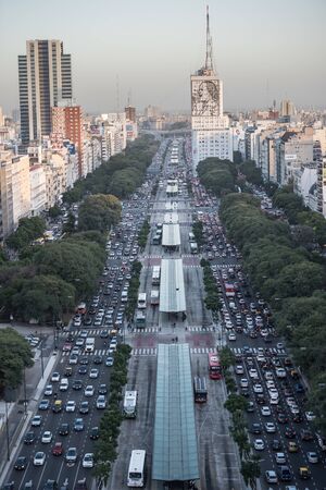 Buenos Aires, Argentina - May 4 2015: Rush hour and traffic on the sreets of Buenos Aires city. This photo shows the downtown and Eva Peron in 9 de Julio Avenue.のeditorial素材