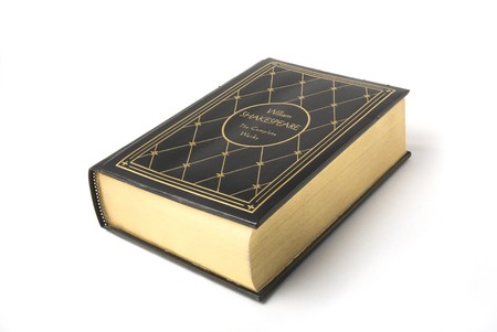 There is a oldest book on the white background with shadowの写真素材