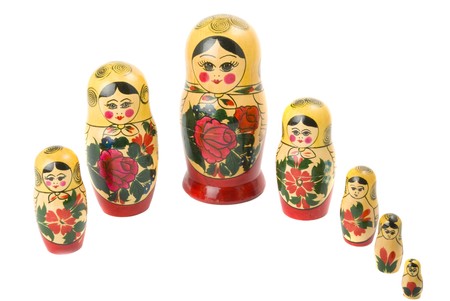 Russian traditional wooden doll isolated on the white backgroundの写真素材