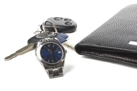watch, wallet and keys for car on the white background with shadow.の写真素材