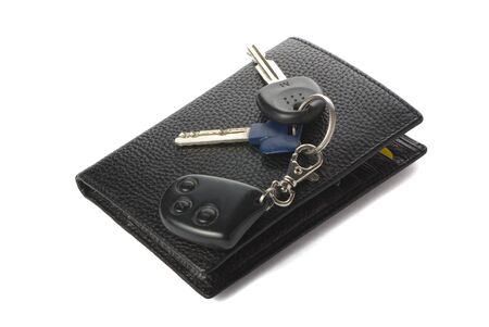The wallet and keys for car on the white background with shadow.の写真素材