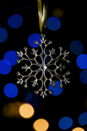Xmas tree snowflake with bokeh lightsの写真素材