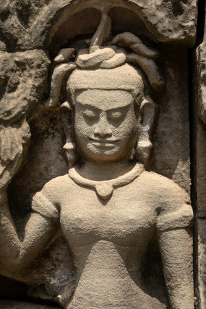 Close-up of stone bas-relief figure of man