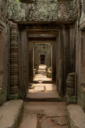 View through stone corridor in ruined templeの写真素材