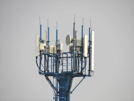 Cell tower radio mast with installed electronic equipment for cellular communication and internet...