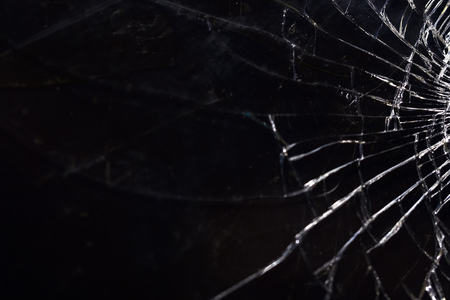 contrasting broken glass on a black background. space for text