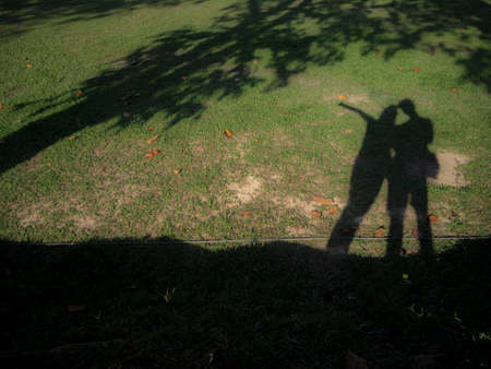 Shadow of two explorers.の写真素材