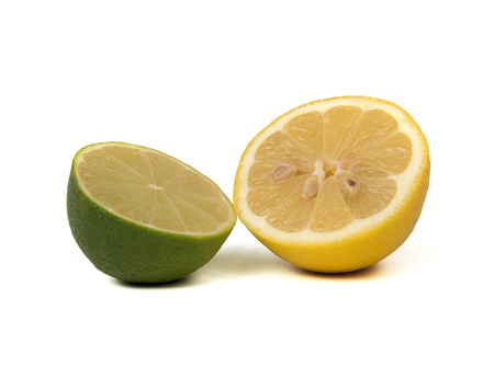 two halves of lime and lemon on a white backgroundのeditorial素材