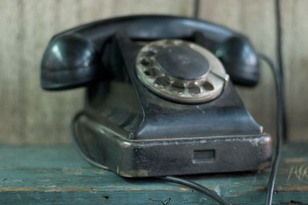 soft-focused closeup of old phone with dialing diskの写真素材