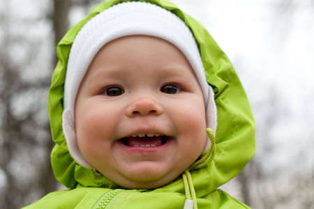 happy smiling little girl looking to the cameraの写真素材