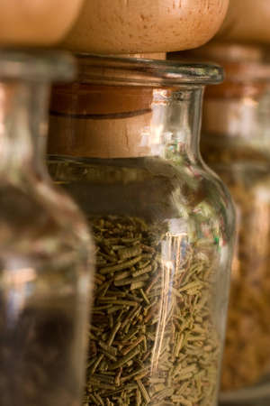 bottle with spice - rosemaryの写真素材