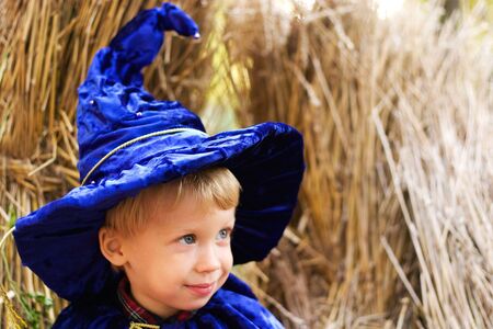 boy in halloween costume - little wizard. Low DOF