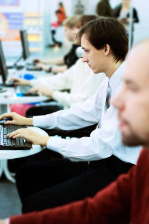 Young businessman working in the office. Low DOF.の写真素材