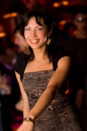 Portrait of girl in the night club. Reporting shoot