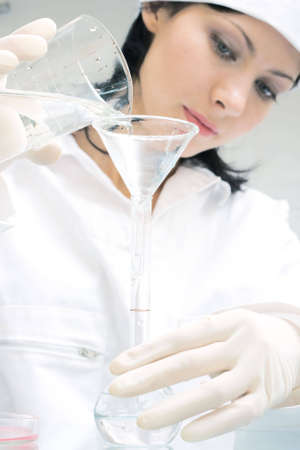 biological test of the water. Soft-focused, focal point is on the hands