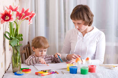 Little child and mother painting and drawingの写真素材
