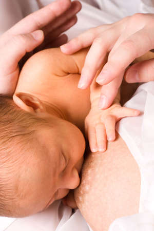 Breastfeeding of newborn (two weeks) child