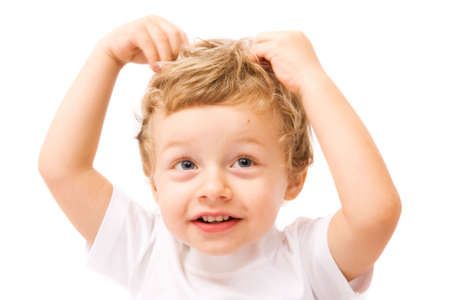 Portrait of cute little boy. Isolated over whiteの写真素材