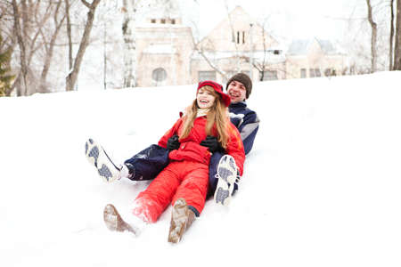 Sliding, joyful game at the chute. Reporting shoot, iso 640の写真素材