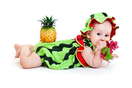 Portrait of cute little boy in watermelon costume. Isolated on whiteの写真素材