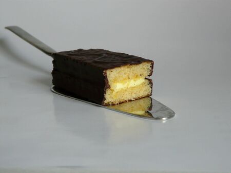 A close up of a Lemmoncake on a cake fork