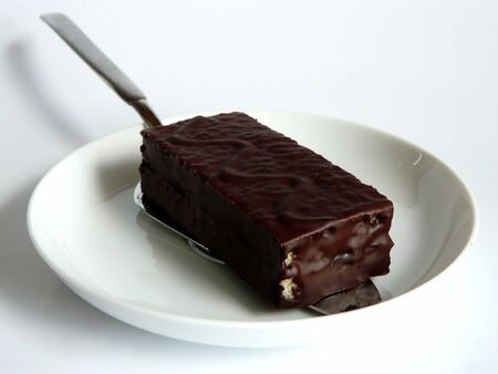 A close up view of a cake with chocolate