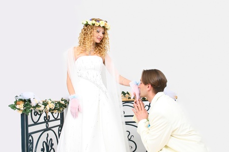 Young couple posing in a studio on the wedding day の写真素材