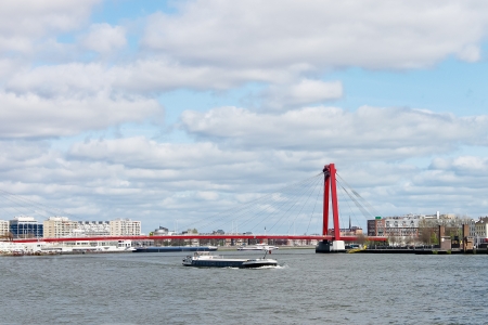  Red suspension bridge over  Maas in Rotterdam. Netherlands