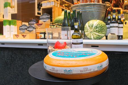 Cheese and wine in a shop windowのeditorial素材