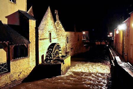 Night Bayeux. Old mill on the river city. Normandyの写真素材