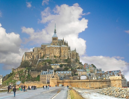 Tourists on the way to the abbey of Mont Saint Michel. Normandy, Franceのeditorial素材