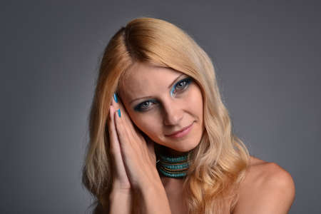 Studio portrait of a girl in blueの写真素材