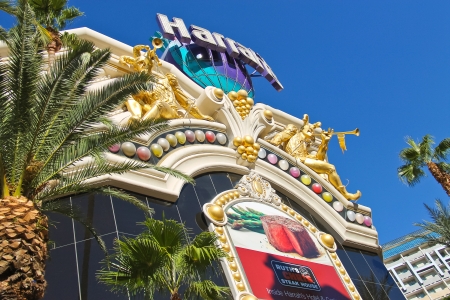 LAS VEGAS, NEVADA, USA - OCTOBER 20 : Harrah's Hotel and Casino Sign on October 20, 2013 in Las Vegas, Harrahs casino features over 1,200 slot machines, 80 table games, Keno, Bingo and a sports book.のeditorial素材