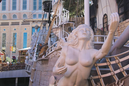 LAS VEGAS, NEVADA, USA - OCTOBER 21, 2013 : Pirate ship at pond near Treasure Island hotel  in Las Vegas. This Caribbean themed resort has an hotel with 2,884 roomsのeditorial素材
